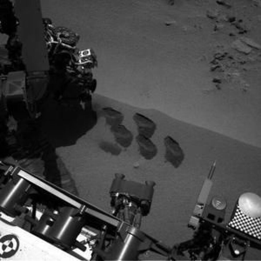 NASA's Mars rover Curiosity dug up five scoops of sand from a patch nicknamed "Rocknest." A suite of instruments called SAM analyzed Martian soil samples, but the findings have not yet been released.