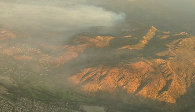 Aerial footage from NBC4 shows smoke from a small brush fire burning in San Dimas, Calif., on Wednesday, September 10, 2014.