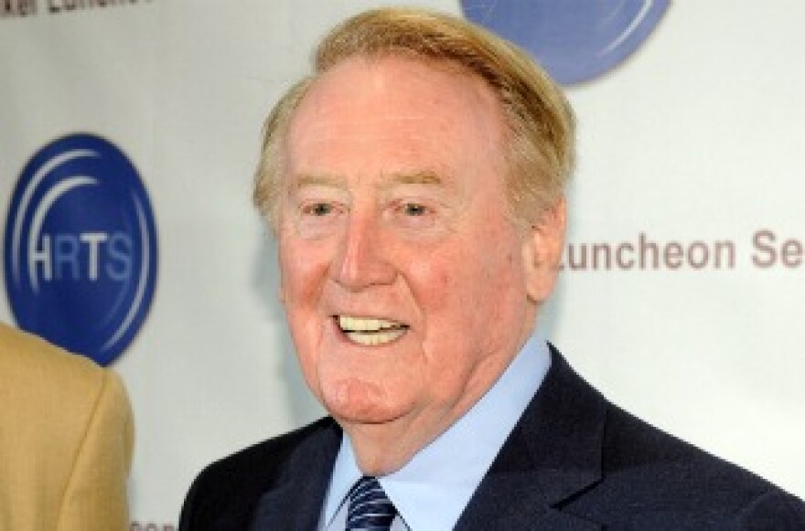 Vin Scully says he's coming back at least another year in 2012 to announce the Dodgers.