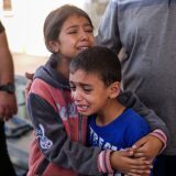 Children crying because of Israeli raids in Khan Yunis, Gaza.