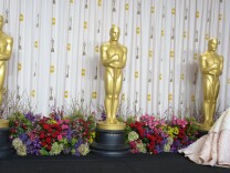 Jennifer Lawrence holds the trophy for Best Actress in the press room during the 85th Annual Academy Awards on February 24, 2013 in Hollywood, California.