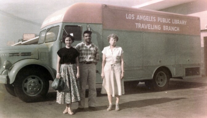 People standing in front of Library Bookmoblie, circa 1950