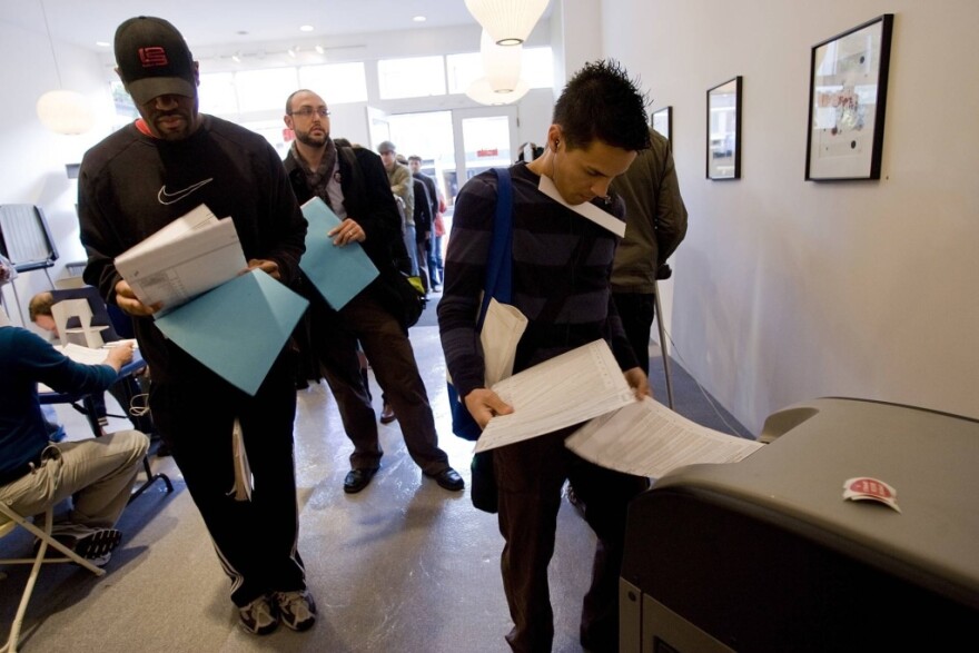 People wait to submit their ballots in San Francisco in 2012.