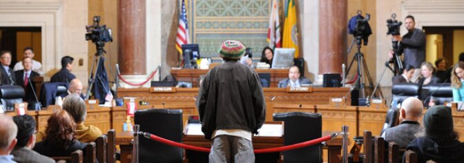 Medical marijuana advocate Ali Rashi gives his speech at a Los Angeles City Council meeting to debate changes to the access and distribution of the drug, in Los Angeles on Dec. 8, 2009.