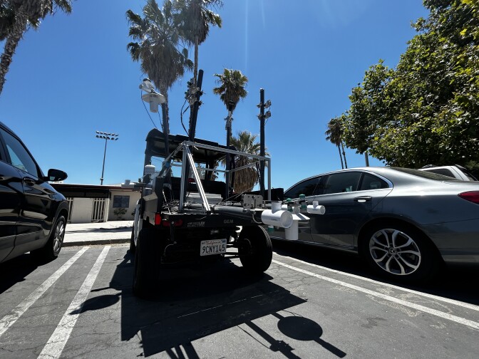 Three images of a modified white golf cart with measuring devices affixed to the back. 