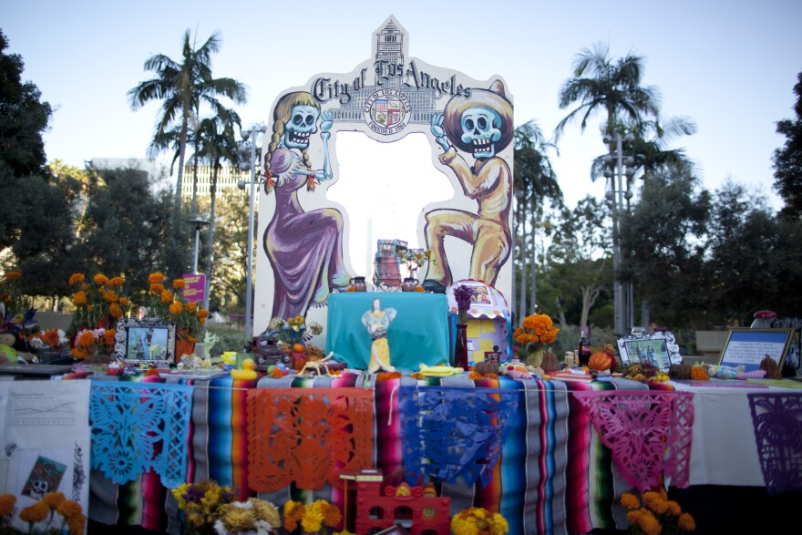 This Dia de Los Muertos alter in Grand Park created by Mayor Garcetti's office, The City of Los Angeles Department of Cultural Affairs and Clinica Romero is dedicated to young children who have lost their lives coming to America to seek a better future.