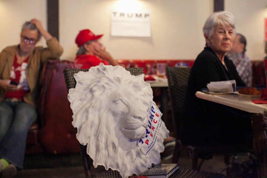 Trump supporters watch the second presidential debate at JJ's Bar & Grill in Santa Clarita, Calif. on Sunday, Oct. 9, 2016.