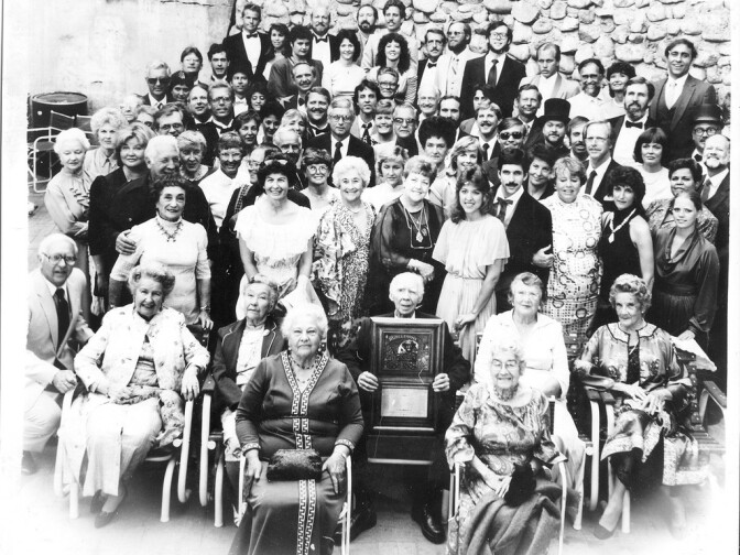 A party to celebrate the completion of the clock tower at the Rubel Castle.