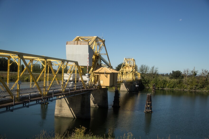 Trucks filled with agricultural products cross a bridge over the Sacramento-San Joaquin River Delta. The so-called Bay Delta Conservation Plan has two "co-equal" goals that are at odds -- restoring the ecosystem while protecting water deliveries to Central Valley farms and Southern California’s growing population.