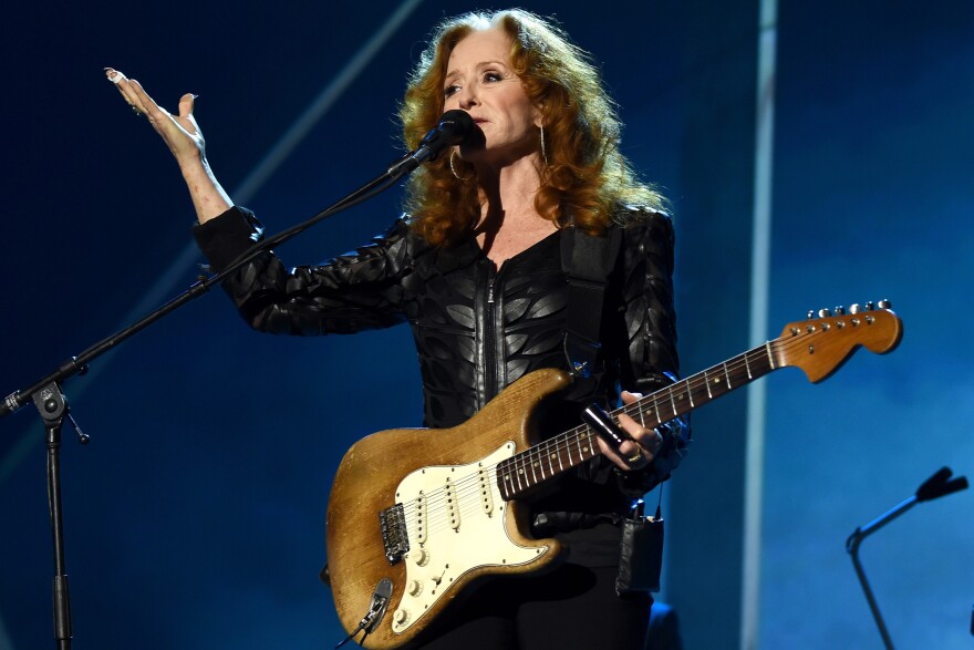 Musician Bonnie Raitt performs onstage at the 25th anniversary MusiCares 2015 Person Of The Year Gala honoring Bob Dylan at the Los Angeles Convention Center on February 6, 2015 in Los Angeles, California.  