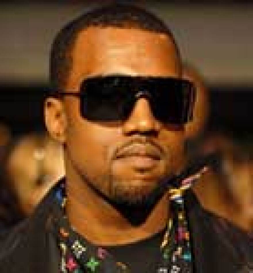 Kanye West faces three misdemeanor charges for a run-in with a photographer at LAX last fall