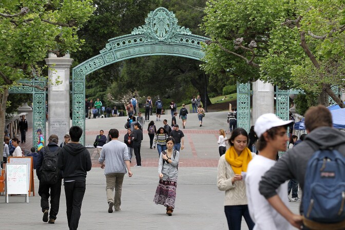 BERKELEY, CA - APRIL 23:  UC Berkeley students walk through Sproul Plaza on the UC Berkeley campus April 23, 2012 in Berkeley, California.  According to reports, half of all recent college graduates are finding themselves underemployed or jobless and the prospects for new graduates dim in a weak labor market.  (Photo by Justin Sullivan/Getty Images)