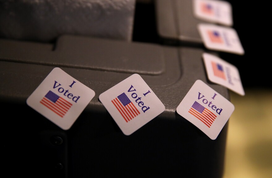  I voted stickers are displayed on a voting machine as democratic senatorial candidate Doug Jones casts his ballot at Brookwood Baptist Church on December 12, 2017 in Mountain Brook, Alabama.