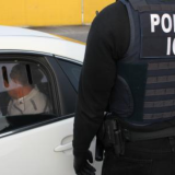 ICE ERO arrested more than 3,100 convicted criminal aliens, fugitives and immigration violators in a six-day nationwide enforcement action. In this photo an ICE agent arrests a criminal alien after arrest in Los Angeles.