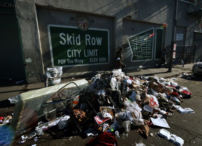 Trash lies beside the Skid Row City Limit mural as the city begins its annual homeless count in Los Angeles, California on January 26, 2018.
Thousnads of volunteers will fan out across Los Angeles County during the three-night count of homeless people whose population is estimated to be nearly 60,000 strong.
 / AFP PHOTO / Mark RALSTON        (Photo credit should read MARK RALSTON/AFP/Getty Images)
