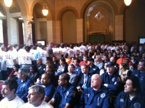 Los Angeles city workers pack City Hall.  They asked the City Council to avoid extending unpaid furlough days and layoffs. The city faces a current $62 million shortfall, and a projected $350 million deficit for the fiscal year that starts July 1.