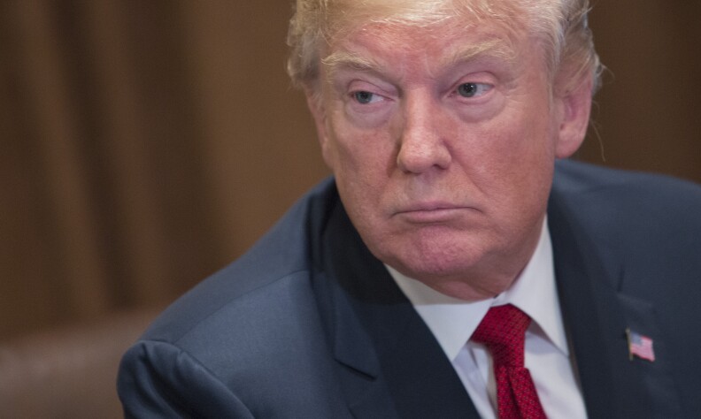 WASHINGTON, D.C. - FEBRUARY 6: (AFP-OUT) U.S. President Donald Trump hosts a law enforcement round table on MS-13 at the White House on February 6, 2018 in Washington, DC. (Photo by Chris Kleponis-Pool/Getty Images)