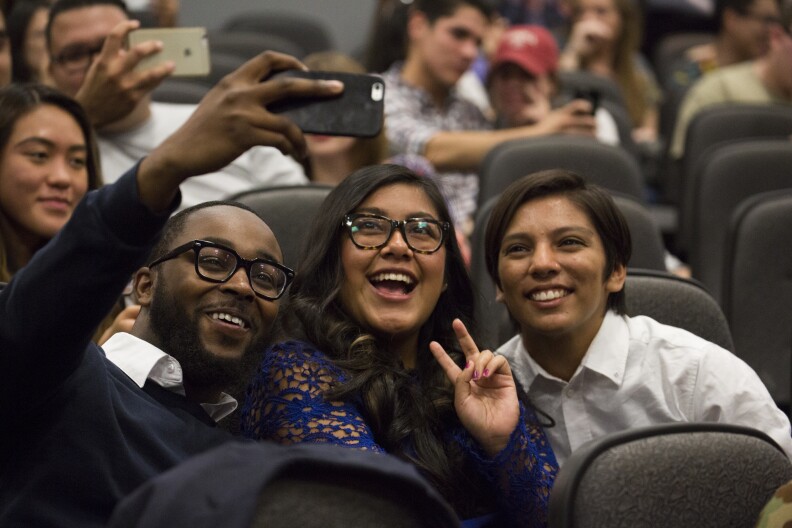 Panelists, Tyree Boyd-Pates, Gloria Alonzo and Destiny Caro join in the group selfie 
