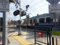A Metro Gold Line train passes through the South Pasadena intersection where a man was struck and killed on January 4, 2014.