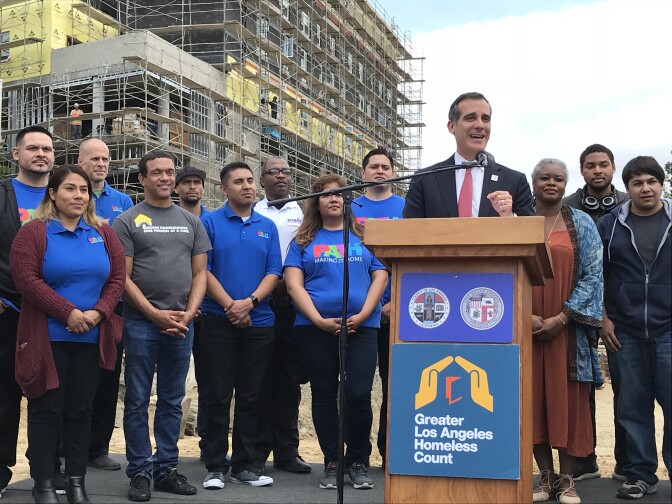 Mayor Eric Garcetti hails the city's first decrease in four years of the number of homeless people living on Los Angeles streets, March 31, 2018.  