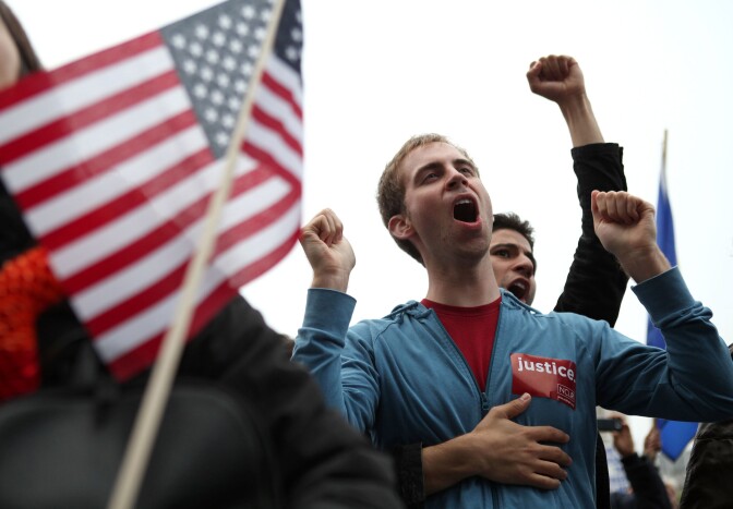 SAN FRANCISCO - AUGUST 04:  Same-sex couple Mark Gaber (L) and Robert Garcia cheer during a rally to celebrate the ruling to overturn Proposition 8 August 4, 2010 in San Francisco, California. U.S. District Judge Vaughn Walker announced his ruling to overturn Proposition 8 finding it unconstitutional. The voter approved measure denies same-sex couples the right to marry in the State of California.  (Photo by Justin Sullivan/Getty Images) *** Local Caption *** Robert Garcia;Mark Gaber