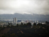 The San Fernando Valley sits under cloud cover on Friday, Feb. 28, 2014 during a rainstorm in Southern California.