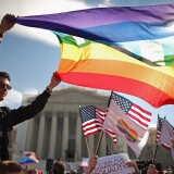 Eric Breese (L) of Rochester, New York, joins fellow George Washington University students and hundreds of others to rally outside the Supreme Court during oral arguments in a case challenging the Defense of Marriage Act (DOMA) March 27, 2013 in Washington, DC. The Supreme Court will hear arguments in the second case this week about same-sex marriage.   