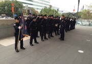 Los Angeles police recruits get ready for a graduation ceremony on Friday, July 8, 2016 outside the department's headquarters. In his speech, LAPD Chief Charlie Beck was expected to address the deadly sniper attacks targeting officers in Dallas on Thursday.