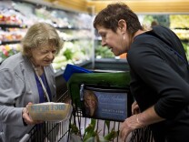 Roommates Shirley Ross, 95, left, and Lois Rubin, 66, grocery shop on Monday afternoon, July 6, 2015. Ross and Rubin are two of many seniors around Los Angeles who are living together as a way to save money.