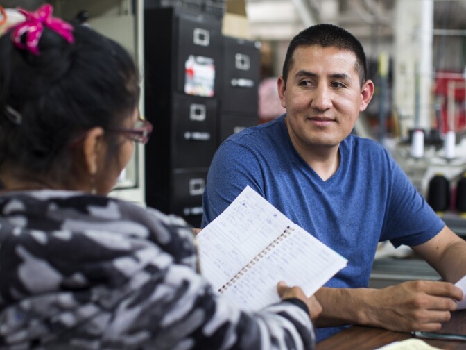 Manager Diego Martinez works with employees at the manufacturing facility for Los Angeles Apparel, the new label started by American Apparel founder Dov Charney, in South Los Angeles on Thursday, June 8, 2017. A year ago, Martinez followed Charney from American Apparel to his new company.