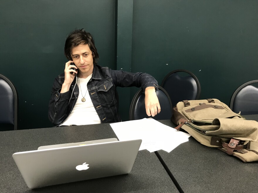 Brad Kaiserman, a criminal defense attorney in favor of bail reform, volunteers at a phone bank for Senate Bill 10.
