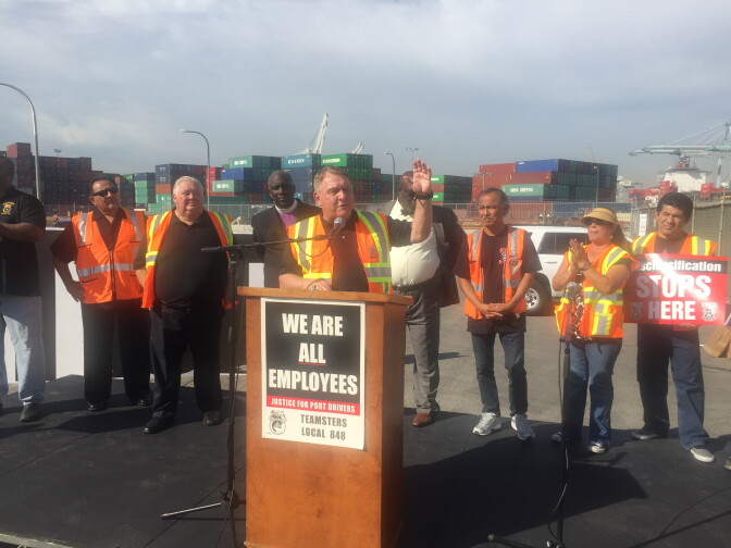 James Hoffa, president of the International Brotherhood of Teamsters, speaks to picketing truck drivers  at the Port of Long Beach. 
