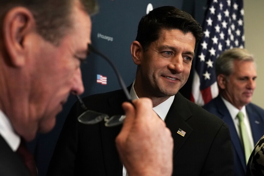 U.S. Speaker of the House Rep. Paul Ryan and House Majority Leader Rep. Kevin McCarthy and Rep. Neal Dunn arrive at a news briefing after a House Republican Conference meeting at the Capitol the day of the House vote on the tax bill. 