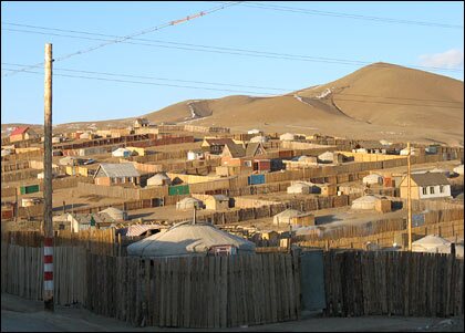 Nomadic herders who lost their animals in recent disastrous winters are moving to Mongolia's capital, Ulaanbaatar, in search of work. Their homes dot the hills surrounding the city.