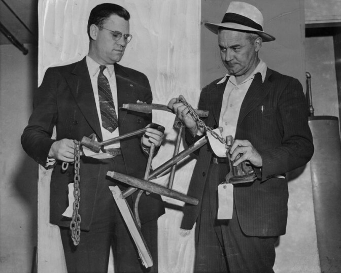 Photograph caption dates August 3, 1942 reads, "Weapons believed used in a bloody birthday party melee are held by Deputy Sheriffs E. M. Smith, left, and Foster Kellogg. The chains were used as flails to strike down youths, victims of the battle declared." Photograph caption dated April 14, 1953 reads, "Brutal weapons used in gang wars. Deputy sheriffs examine broken chairs, chains, and crowbars used by teenagers in wars without reason." The melee referenced in the 1942 caption was tied to the death of José Gallardo Díaz. 