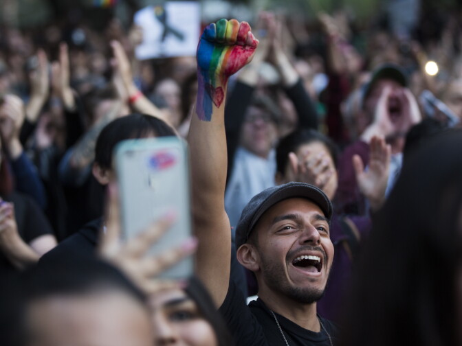 Thousands attend a vigil on Monday, June 13, 2016 at Los Angeles City Hall memorializing those who died in Sunday's attack in Orlando.