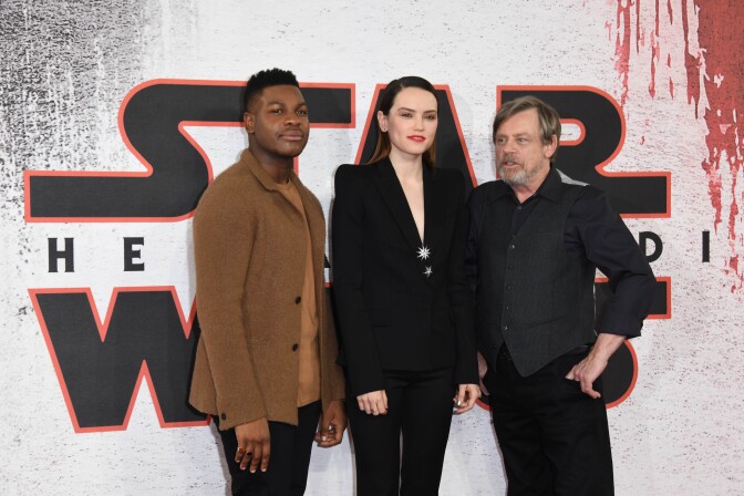 LONDON, ENGLAND - DECEMBER 13:  John Boyega, Daisy Ridley and Mark Hamill during the 'Star Wars: The Last Jedi' photocall at Corinthia Hotel London on December 13, 2017 in London, England.  (Photo by Stuart C. Wilson/Getty Images)