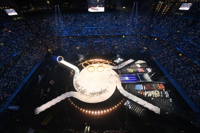  An aerial view of the athletes parading into the San Siro stadium.