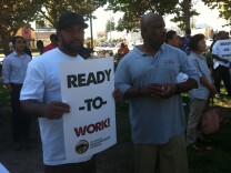 Construction workers, advocates and community leaders participate in a jobs rally at Leimert Park in South Los Angeles on Sept. 7, 2013. Workers from the surrounding neighborhoods are lobbying to be hired for thousands of jobs along the upcoming Crenshaw/LAX Transit Corridor Project when construction begins in the Spring of 2014.