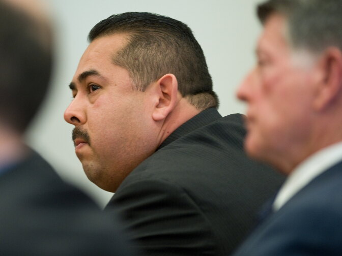 Fullerton police Officer Manuel Ramos reacts as the not guilty verdict is read in the Kelly Thomas murder trial Monday. Manuel Ramos was acquitted of second-degree murder and involuntary manslaughter charges stemming from the 2011 death of transient Kelly Thomas. His lawyer John Barnett is at right.
POOL PHOTO, MINDY SCHAUER, ORANGE COUNTY REGISTER