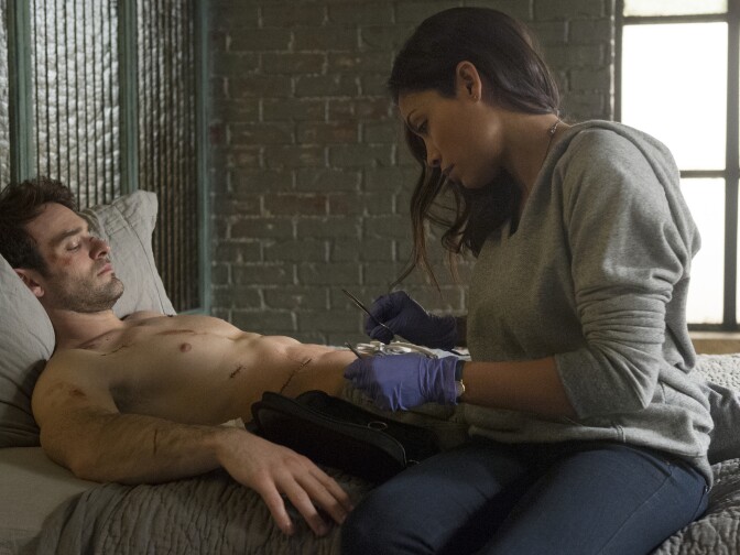 (L-R) Charlie Cox as Matt Murdock and Rosario Dawson as Claire Temple in the Netflix Original Series “Marvel’s Daredevil."