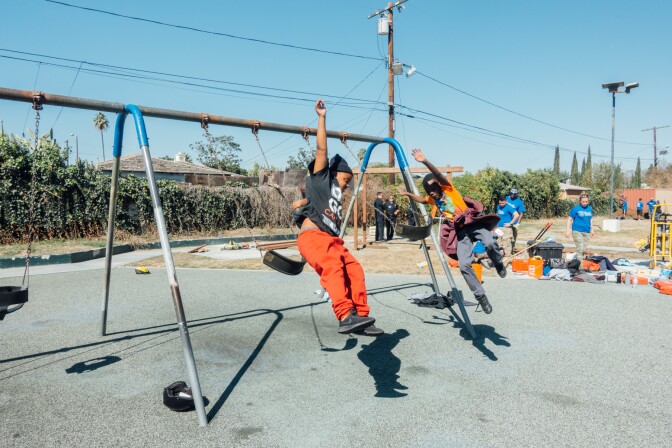 Fun on the swing set at Gonzaque Village in Watts during the Mission Continues service platoon event on Saturday, February 24th, 2018.