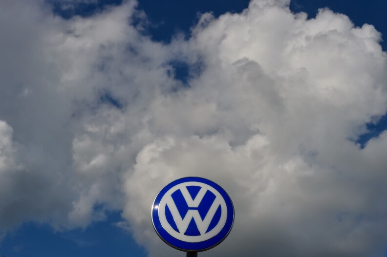 The logo of German car maker Volkswagen is pictured at the company's headquarters in Wolfsburg, central Germany, on September 25, 2015 during the company's supervisory board meeting. Matthias Mueller, head of luxury sportscar maker Porsche, looks set to take the steering wheel at scandal-hit Volkswagen, replacing Martin Winterkorn who quit over the global pollution cheating scandal engulfing the group.  AFP PHOTO / JOHN MACDOUGALL        (Photo credit should read JOHN MACDOUGALL/AFP/Getty Images)