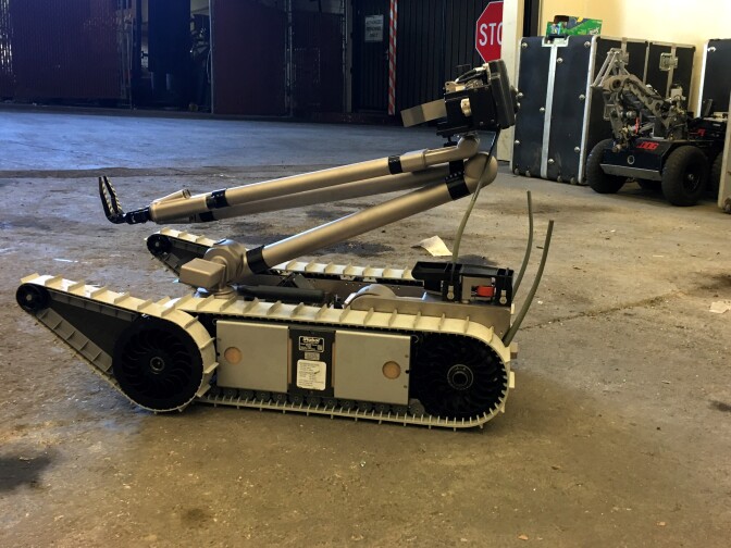 The iRobot PackBot at the West Covina Police Department, obtained through the Department of Defense's 1033 Program. In the background is the WCPD's 'Bulldog' robot.