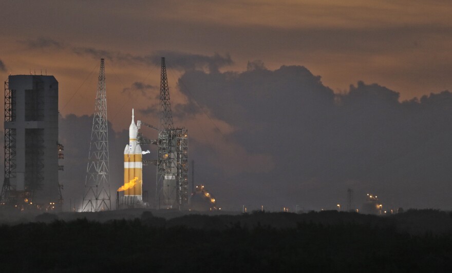 NASA's Orion spacecraft, atop a  United Launch Alliance Delta 4-Heavy rocket, sits on the launch pad before its first scheduled unmanned orbital test flight from the Cape Canaveral Air Force Station, Thursday, Dec. 4, 2014, in Cape Canaveral, Fla. (AP Photo/Chris O'Meara)
