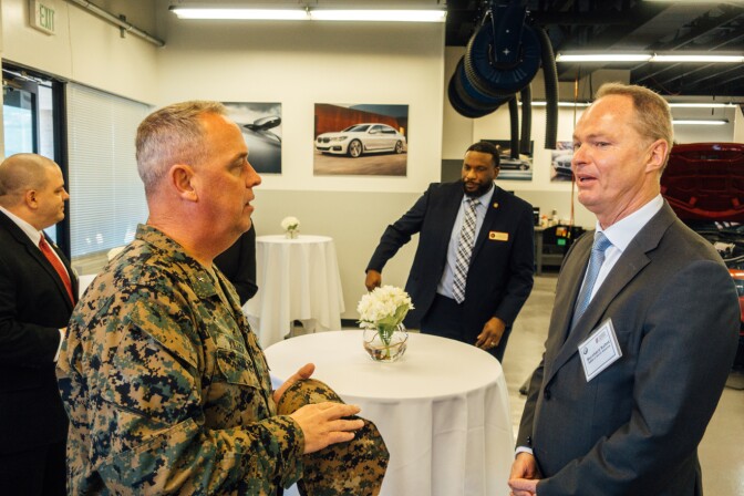 Brigadier General Kevin Killea (left) and Bernhard Kuhnt, CEO of BMW of North America.