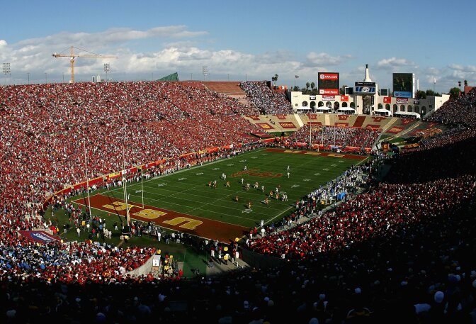 LOS ANGELES, CA - DECEMBER 01:  General view as the UCLA Bruins kick off to the USC Trojans to start the college football game at the Los Angeles Memorial Coliseum on December 1, 2007 in Los Angeles, California. The Trojans defeated the Bruins 24-7.  (Photo by Christian Petersen/Getty Images)