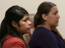 Vanesa Tapia Zavala (L) and Candace Marie Brito at their preliminary hearing in the West Justice Center February 11, 2014 in Westminster, California. The two are charged in the beating death of Kim Pham in front of a Santa Ana nightclub.