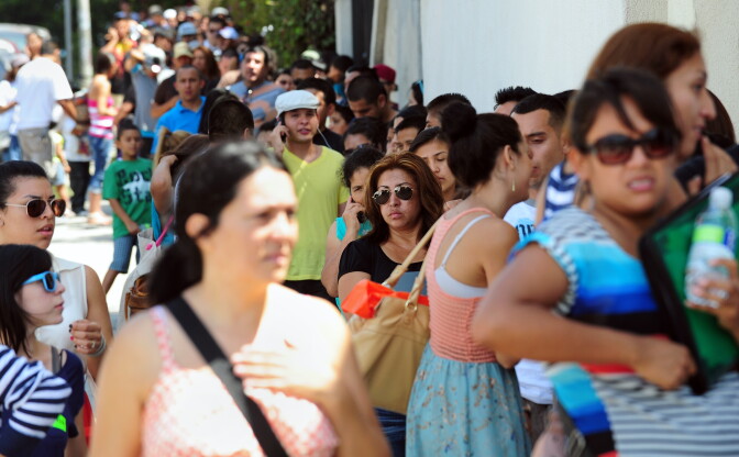 This Aug. 15, 2012 file photo shows a huge crowd forming a line around the block from the office of The Coalition for Humane Immigrant Rights of Los Angeles (CHIRLA) in California, on the first day of the Deferred Action for Childhood Arrivals (DACA) program. More than 460,000 immigrants in Los Angeles County could be eligible for temporary immigration relief under President Obama's executive order, according to a new estimate. But relatively few will be people eligible for an extended version of DACA; the bulk will be parents of U.S. citizens and legal permanent residents who have lived in the country five years or more.