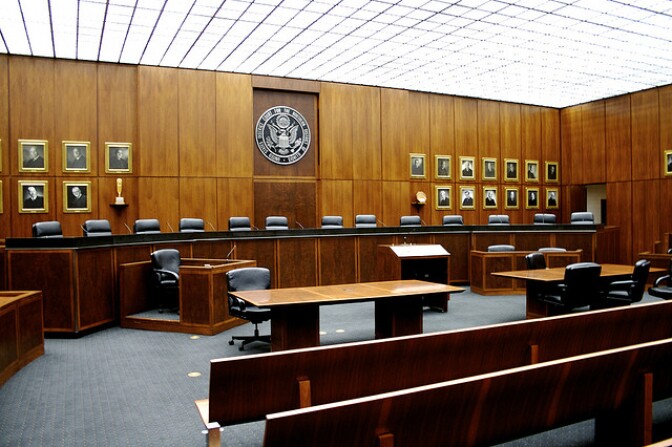 A large, empty court room. 